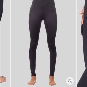 2 Pairs of Vie Active cropped leggings with pockets size small